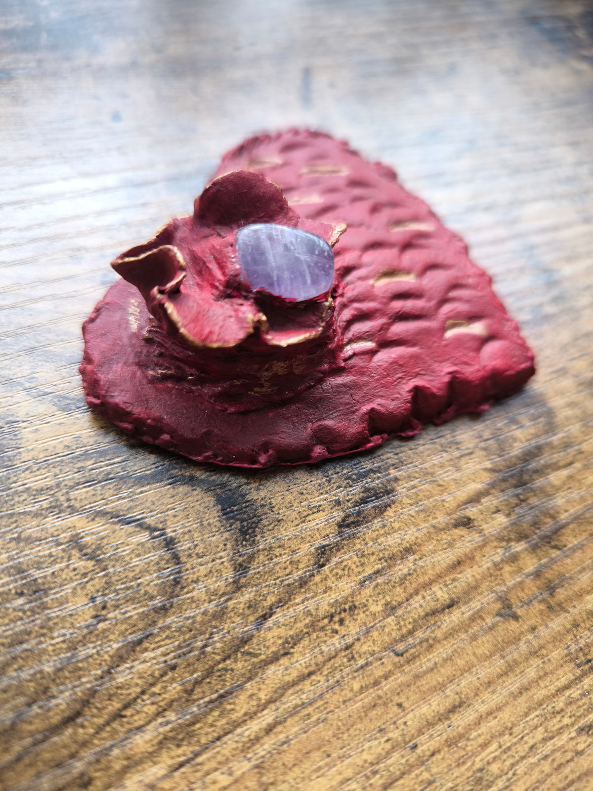 Clay heart with a crystal