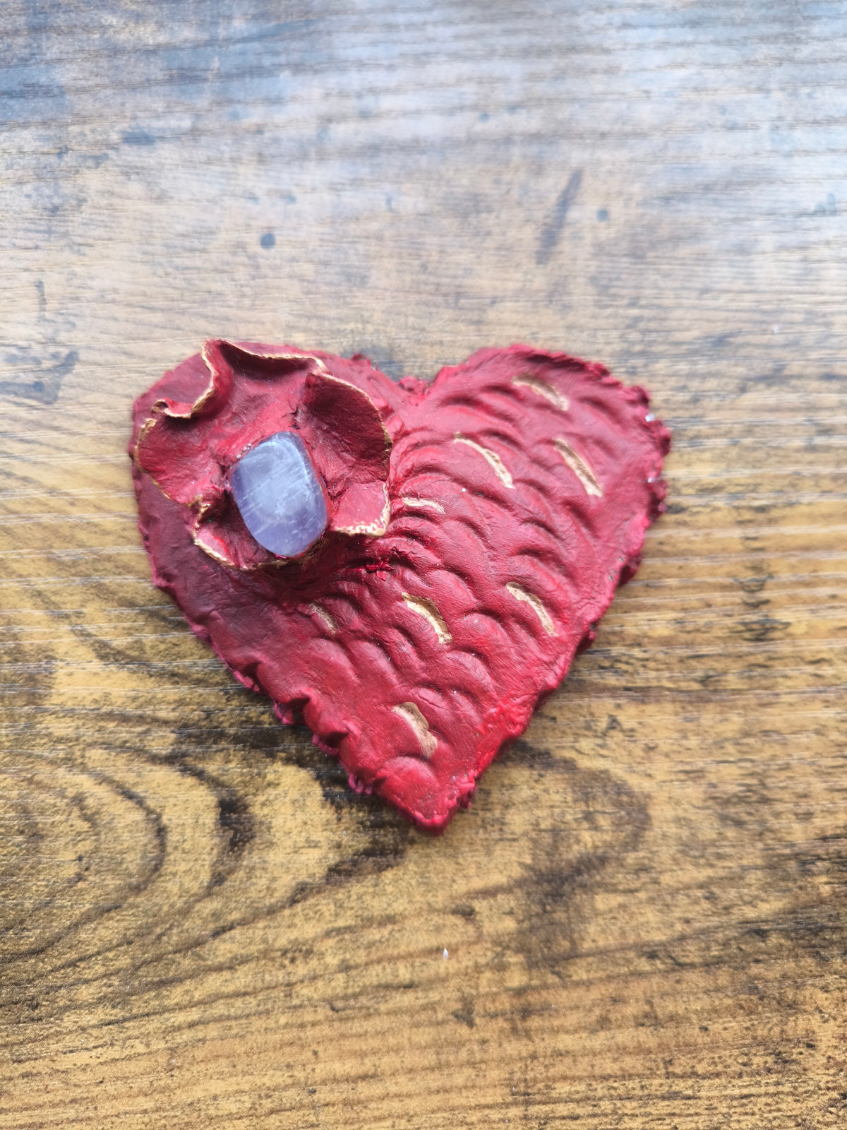 Clay heart with a crystal